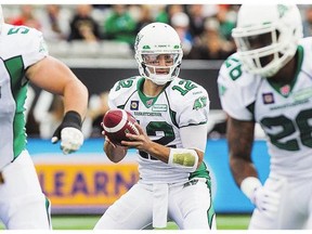 Saskatchewan Roughriders quarterback Tino Sunseri looks to throw a pass against the Hamilton Tiger-Cats during the first half of their CFL game at Tim Hortons Field in Hamilton on Sunday. See coverage on pages C1-C2.