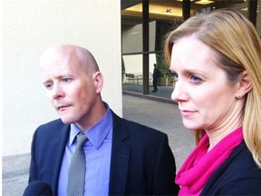 Scott Allnutt and his wife Melissa Brown-Allnutt outside the Edmonton Law Courts on Oct. 16, 2013.