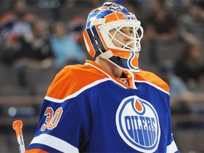 Ben Scrivens of the Edmonton Oilers, against  the Calgary Flames in preseason NHL action at Rexall Place in Edmonton on Sept. 21, 2014.
