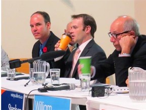 Some of the candidates running in the Edmonton-Whitemud byelection, left to right, Tim Grover, Wildrose party, Rene Malenfant, Green party, Stephen Mandel, Progressive Conservative party, take part in a debate on Oct. 22, 2014.