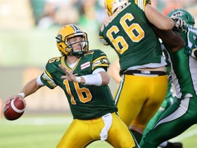 Edmonton Eskimos quarterback Matt Nichols looks for a receiver during CFL pre-season game action against the Saskatchewan Roughriders in Edmonton on June 14, 2013.