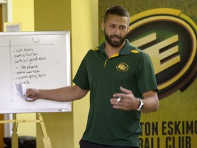 Edmonton Eskimos quarterback Mike Reilly had his right thumb taped up and could only handle the football with his left hand during Friday’s practice at Commonwealth Stadium.