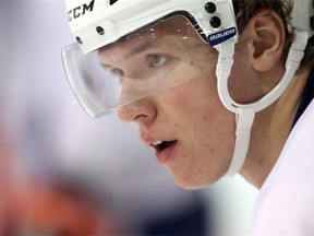 Edmonton Oilers prospect Bogdan Yakimov watches teammates at practice in the at the Youngstars Tournament in Penticton, B.C., on Sunday September 14, 2014.