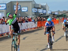 Sep Vanmarcke from Belgian points skyward after crossing the finishline in first during Stage 3, 157 km from Wetaskiwin to the Edmonton Garrison at the 2014 Tour of Alberta in Edmonton, September 5, 2014. Second was Ramunas Navardauskas from Lithuania and third taken by Leigh Howard from Austria.