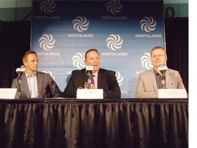 Stephen Petasky, left, Tim Reid and Mack Male, of the Northlands Arena Strategy Committee, speak to the media on Friday, Dec. 5, 2014.