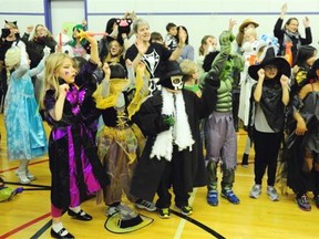 The students at Windsor Park School designed masking tape creatures, carved pumpkins, had a costume parade, and sang French and English Halloween songs in Edmonton on Friday, Oct. 31, 2014. Video by Bruce Edwards, Edmonton Journal.