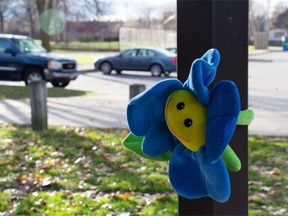 A stuffed animal is fixed to the pillar of a gazebo at Cudell Commons Park in Cleveland, Ohio, where a memorial was set up for Tamir Rice, a 12-year-old boy shot by police on Nov. 23 for wielding a replica handgun.