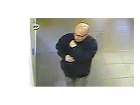 A surveillance image released in connection with a voyeur complaint at the Lois Hole library in December 2013.