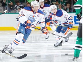 Taylor Hall of the Edmonton Oilers handles the puck against the Dallas Stars at the American Airlines Center on Nov. 25, 2014 in Dallas.