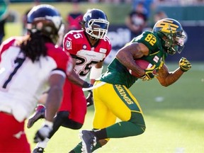 Edmonton Eskimos slotback A.J. Guyton races towards the end zone to score a 26-yard pass-and-run touchdown during Saturday’s Canadian Football League game against the Calgary Stampeders at Commonwealth Stadium.