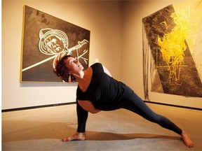 Tori Lunden is teaching a yoga course set in various rooms of the Alberta Art Gallery.