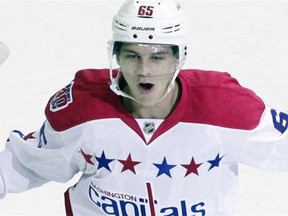 Washington Capitals centre Andre Burakovsky celebrates after scoring a goal during the first period of an NHL hockey game against the Montreal Canadiens, Thursday, Oct 9, 2014, in Washington.