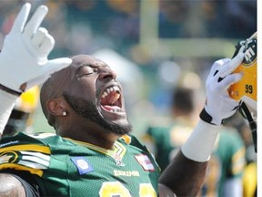 De Willie Jefferson celebrates with the crowd in the first half during a game between the Edmonton Eskimos and Toronto Argonauts in Commonwealth Stadium on Aug. 23, 2014.