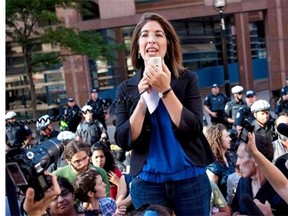 Writer Naomi Klein addresses a crowd outside Toronto police headquarters on Monday June 28, 2010. The Canadian journalist and social activist has won this year’s Hilary Weston Writers’ Trust Prize for Nonfiction.