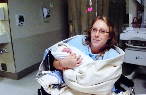 Jamie Sullivan holds her newborn daughter, Delonna, in hospital hours after her birth on Nov. 23, 2010.