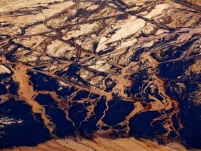 An aerial view of Suncor’s tailings pond 5 at their oilsands mining and upgrading facility north of Fort McMurray on June 18, 2013.