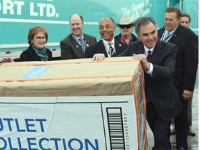 Alberta Premier Jim Prentice was at the Edmonton International Airport to praise two new developments worth $225 million in investment and 1,000 jobs. One is the already announced Outlet Collection at EIA and the other is the new Rosenau Transport facility at EIA.
