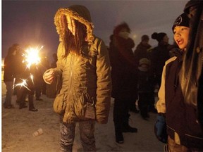 Ariana Dolega-Cieszkowski, 10, takes part in New Year’s Eve festivities at Haddow Park, hosted by the neighbourhood community league in Edmonton on Wednesday, Dec. 31, 2014. The event may be its last family fun night as the City of Edmonton slated this surplus school site for townhouses.