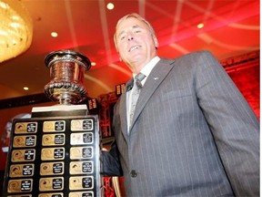 Calgary Stampeders head coach John Hufnagel wins the Canadian Football League’s coach of the year award at a banquet in Winnipeg on Wednesday.