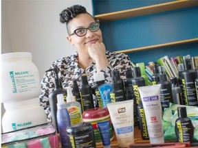 Catherine Clune-Taylor displays all the products she currently has for her hair.