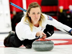 Chelsea Carey throws a rock during the ‘A’ Event final of the Alberta women’s curling championship on Thursday. It was the last game she played with her stainless steel slider of 15 years before it was stolen on Friday morning out of a dressing room at the Lacombe Arena.