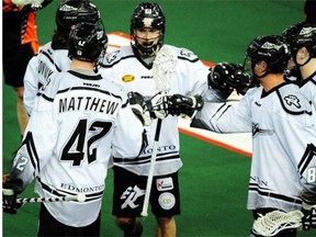 EDMONTON, ALTA: /March/ 21, 2014 --The Rush celebrate a goal at the Edmonton Rush lacrosse game against the Buffalo Bandits at Rexall Place in Edmonton , March 21, 2014.  (Photo by Bruce Edwards/Edmonton Journal)