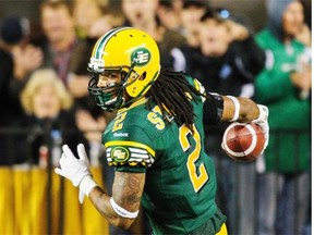 Edmonton Eskimos slotback Fred Stamps celebrates after scoring a touchdown against the Saskatchewan Roughriders during a Canadian Football League game at Commonwealth Stadium on Sept. 26, 2014.