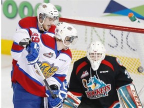 Edmonton Oil Kings Brett Pollock watches Dysin Mayo’s point shot beat Kelowna goalie Jake Morrissey Wednesday night.