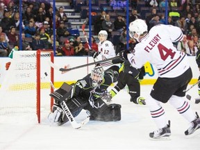 Edmonton Oil Kings goalie Tristan Jarry makes a save against Red Deer Rebels defenceman Haydn Fleury during Saturday’s Western Hockey League game at Rexall Place.