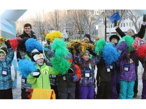 Edmonton Mayor Don Iveson, left, and Coun. Ben Henderson were joined by schoolchildren to celebrate the announcement at Churchill Square of the first Edmonton Shake-Up Festival and Market to be held at the square on Jan. 30, 2015.