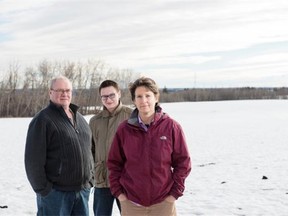 From left, Doug Visser, Kelly Ridsdale and Kelly Mills. Visser and Mills have created Lady Flower Gardens, an agriculture project that makes the experience of growing and harvesting fresh vegetables available to new Canadians and people living on the streets. The project is threatened by a proposed provincial road. Kelly Ridsdale is a volunteer at the garden.