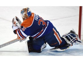 Goalie Viktor Fasth (35) makes a save as the Edmonton Oilers play the Detroit Red Wings at Rexall place in Edmonton, January 6, 2015.