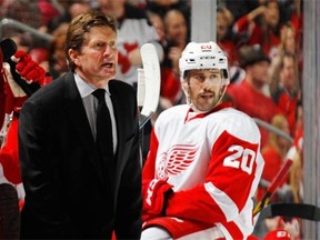 Head coach Mike Babcock of the Detroit Red Wings argues a second period call during a National Hockey League game against the New Jersey Devils at the Prudential Center in Newark, N.J., on Nov. 28, 2014.