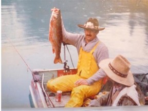 Hinton master fisherman Dave Robson holds up the 5.7-kg brook trout he caught in 1984, a National Fresh Water Fishing Hall of Fame world record on 3.6-kg test line.