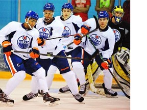 From left, Jujhar Khaira, Darnell Nurse, Leon Draisaitl, Dillon Simpson and goalie Zach Nagelvoort take part in the Edmonton Oilers annual prospect development camp in Jasper on Thursday, July 3, 2014.