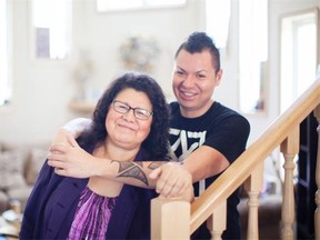 Massey Whiteknife, an aboriginal drag queen from Fort McMurray, poses with his mother.