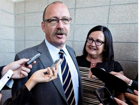 Ric McIver and his wife Christine speak to media before the results of the Progressive Conservative leadership first ballot in Edmonton on Saturday, Sept. 6, 2014.