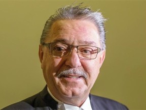 Alberta Speaker Gene Zwozdesky speaks to the media to confirm that the Wildrose Party will remain official Opposition.