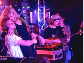 Mac DeMarco’s mom, Agnes, kisses him onstage at Baby’s All Right last April in Brooklyn.