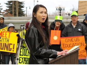 Not all paretns are buying into the rewrite of the Alberta school curriculum, including Dr. Nhung Tran-Davies, shown here at a protest of the province’s discovery math learning system in April 2014.