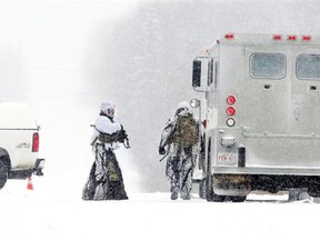 RCMP snipers ready themselves during a standoff in Strathcona County on Jan. 16, 2011.