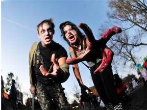 The skills you’ll learn at the Edmonton Resilience Festival on Feb. 7 and 8 could help you prepare for a zombie apocalypse. Joachim Neumannand Scheherazade Showleh pose for a photo before the start of the zombie parade in this file photo.