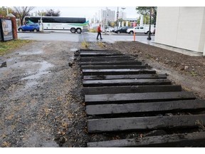 CP started ripping up railway lines and removing the crossing arms at Whyte Avenue, just east of the Strathcona Hotel in Edmonton on Sept. 26, 2014.