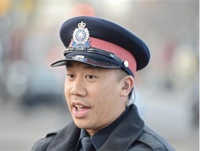 Old Strathcona beat constable Matthew Li talks about car-pedestrian safety on Whyte Avenue on Tuesday, Jan. 27, 2015. A young boy was seriously injured recently while crossing 104th Street on Whyte Avenue on Jan. 22.