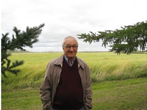 Albert Bandura, professor emeritus of social science in psychology at Stanford University, and a new officer of the Order of Canada, stands in front of the farm in Mundare where he spent his childhood.