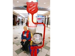 Agnes Morgan tends the Salvation Army kettle at an Edmonton mall in December 2010.