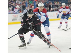 Ashton Sautner of the Edmonton Oil Kings, chases after Grayson Pawlenchuk of the Red Deer Rebelsduring Wednesday’s Western Hockey League game at Rexall Place.