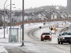 Cars move along icy roads in Edmonton in 2012.