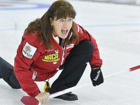 Cathy King yells to her sweepers during the 2013 Alberta senior women’s curling championship final at the Granite Curling Club on Feb. 17, 2013.
