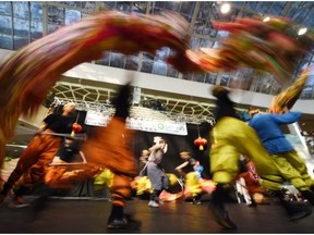 The Chiu Lau Kung Fu College performs a Dragon Dance during the Edmonton Chinatown Multicultural Center’s traditional Chinese Lunar New Year celebration event at the Ice Palace at West Edmonton Mall in Edmonton on Saturday Feb. 7, 2015. This annual event, which this year welcomes the Year of the Sheep, is in the format of a trade show, with continuous cultural performances throughout the two-day, fun-filled celebration.